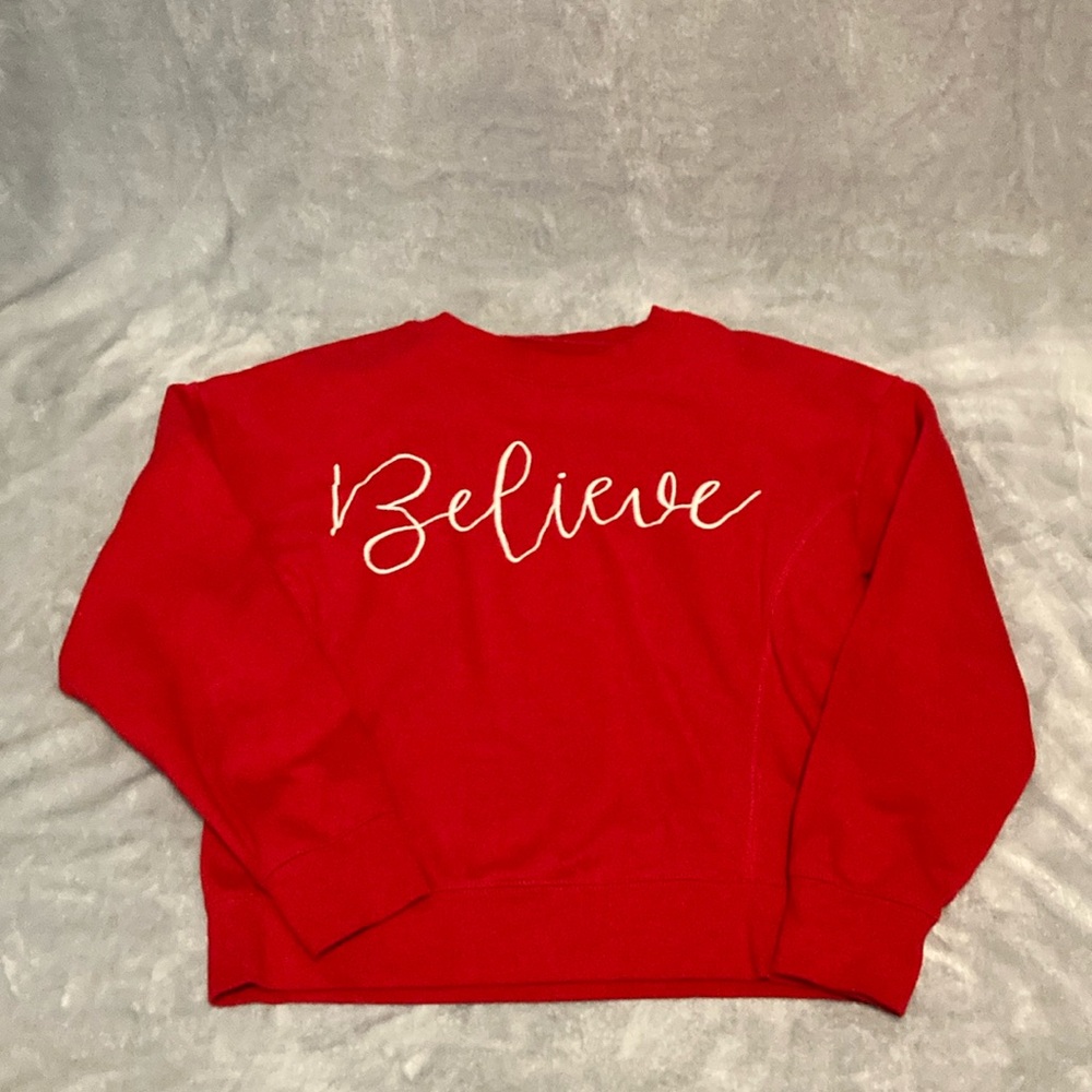 1897 red ‘Believe’ crewneck